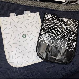 Lululemon one black and one white small tote bags